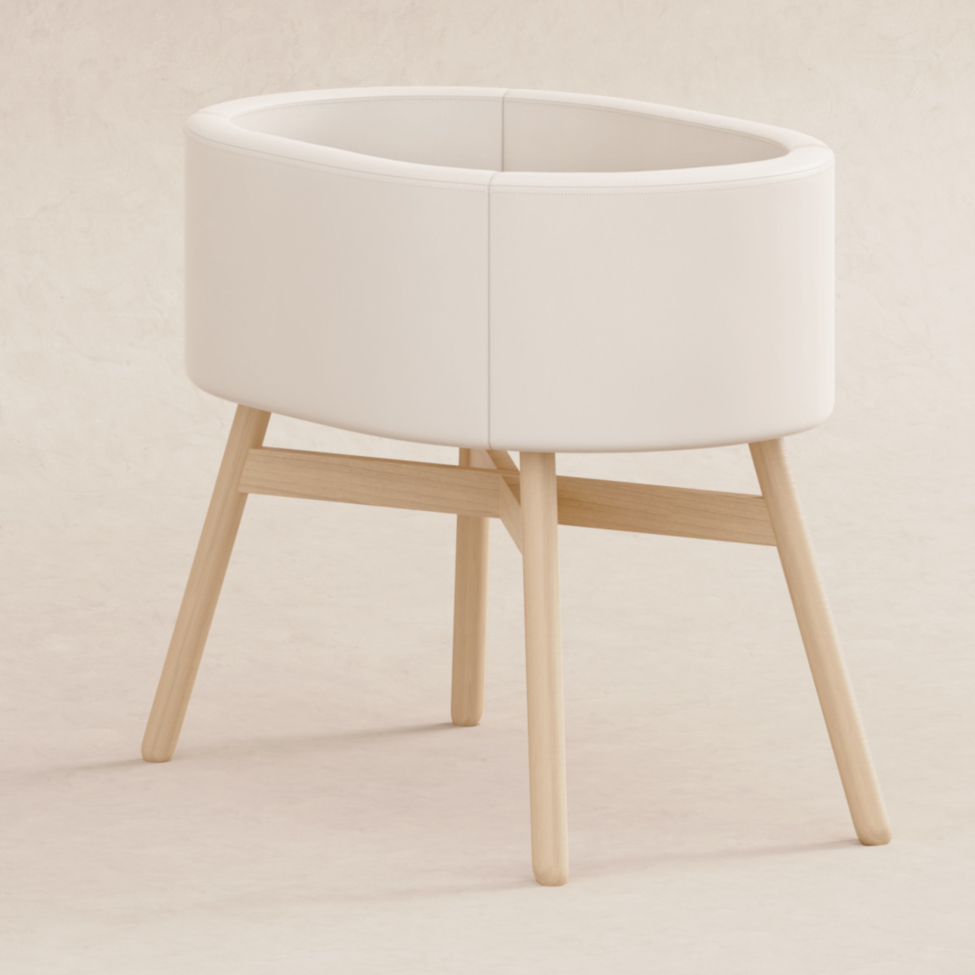 M26834GYLB,Babyletto,babyletto x GATHRE Capsule Bassinet in Ivory