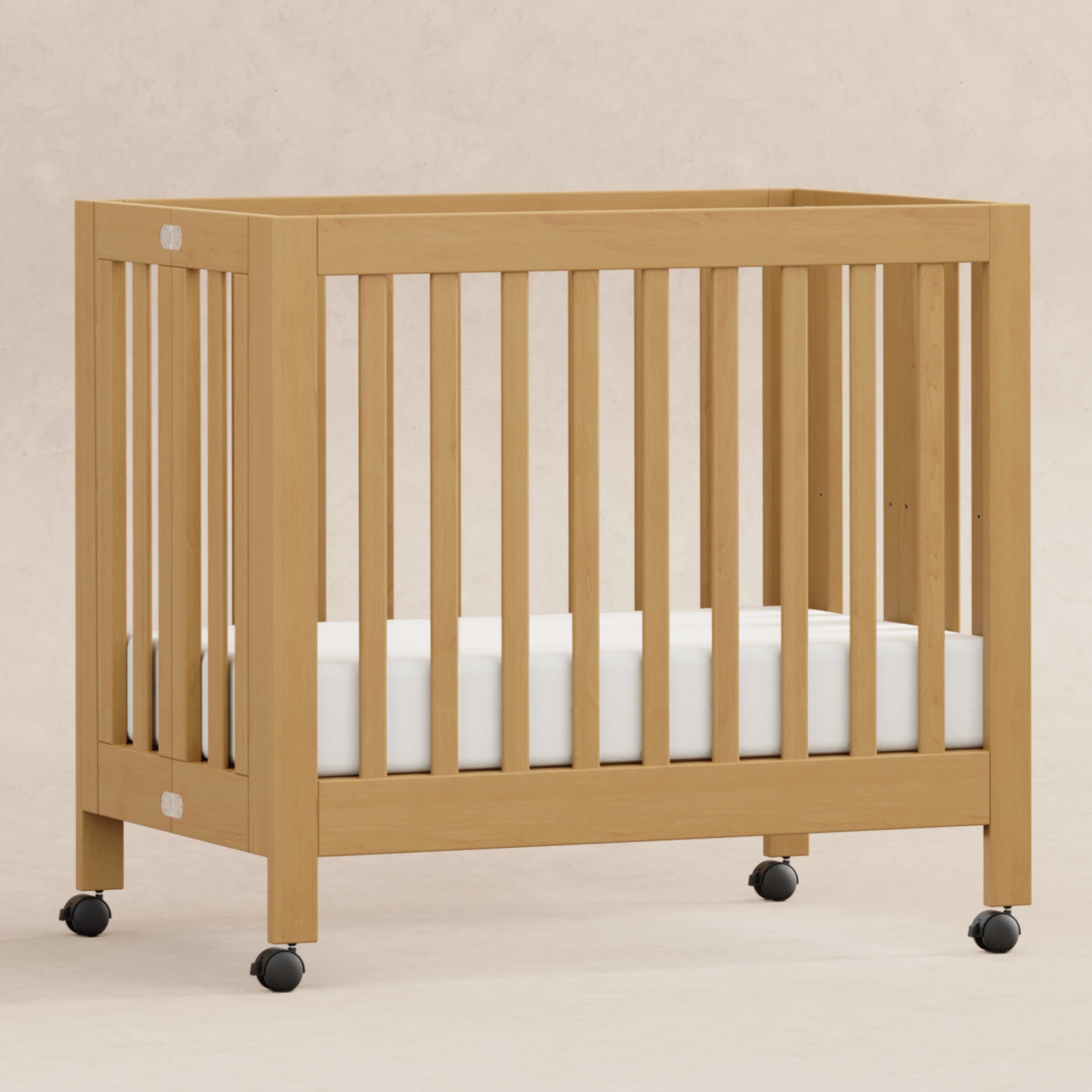 Origami Portable Mini Crib With Wheels | Babyletto