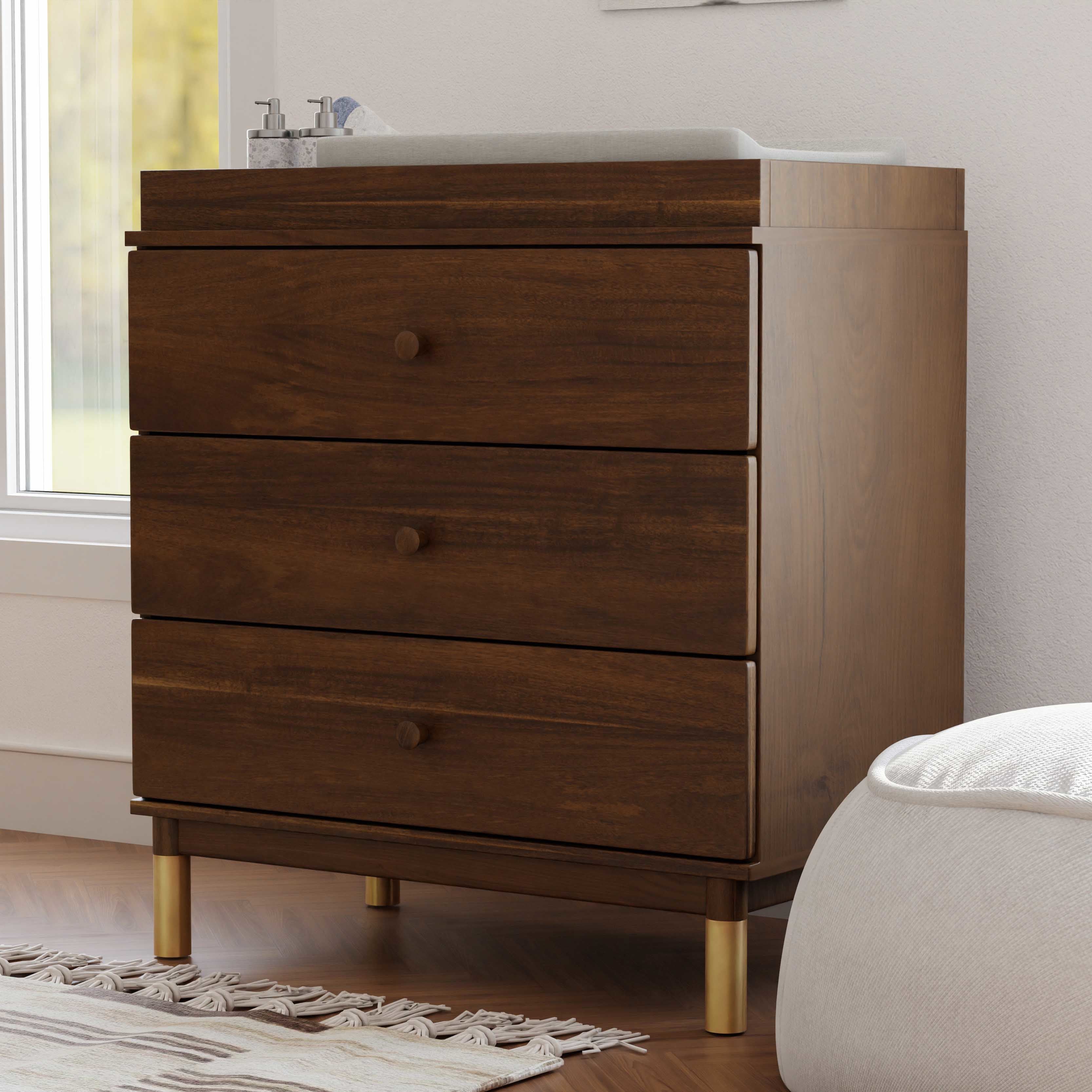 M12923NLGLD,Babyletto,Gelato 3-Drawer Changer Dresser  Gold Feet w/Removable Changing Tray in Natural Walnut